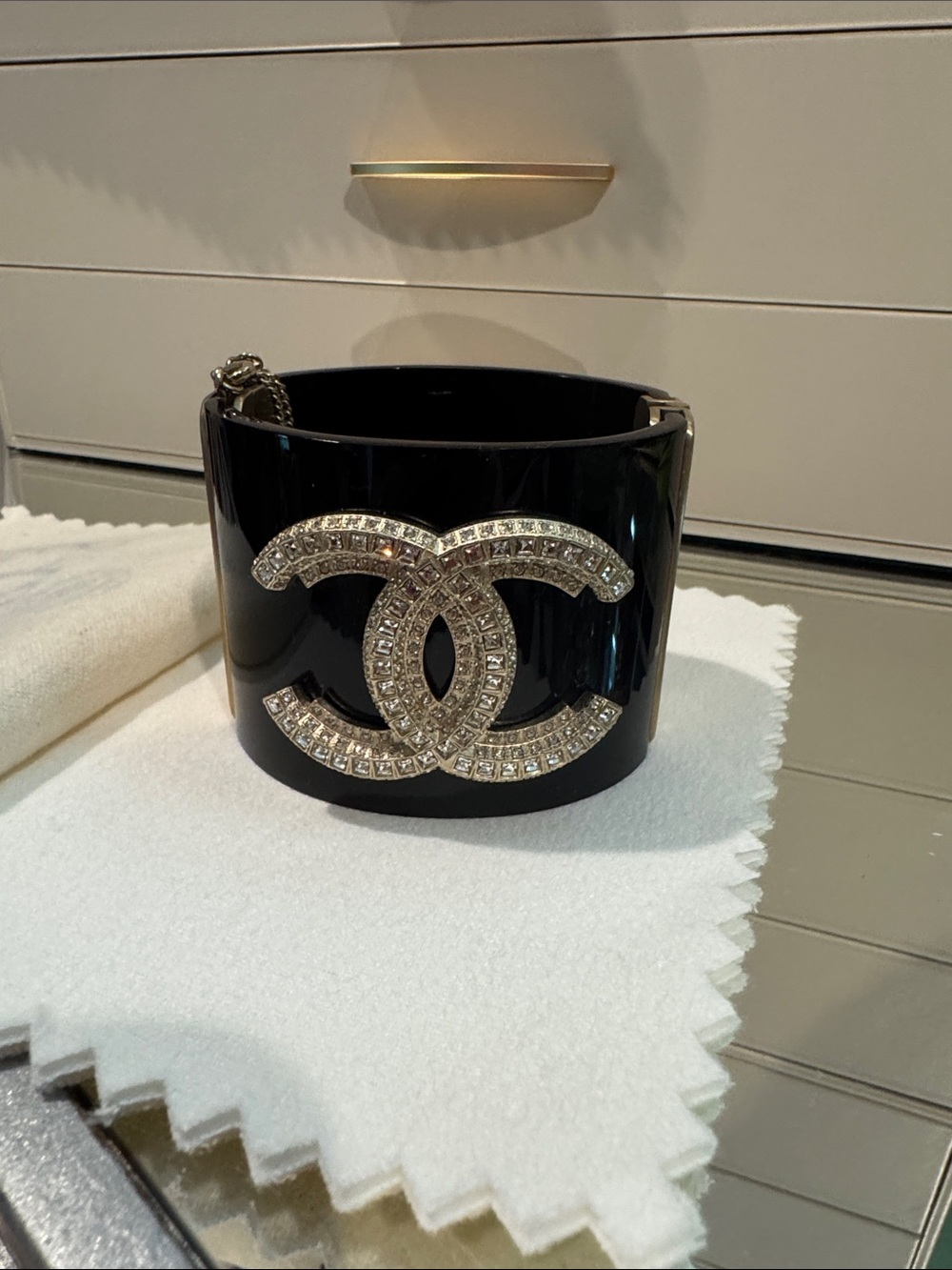 CHANEL Black Resin Cuff Bracelet with Crystal CC Emblem